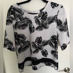 White and black palm print blouse